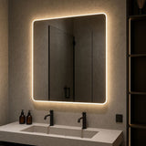 Bathroom vanity with illuminated mirror and sink