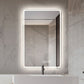 Bathroom mirror with LED lighting on a marble wall