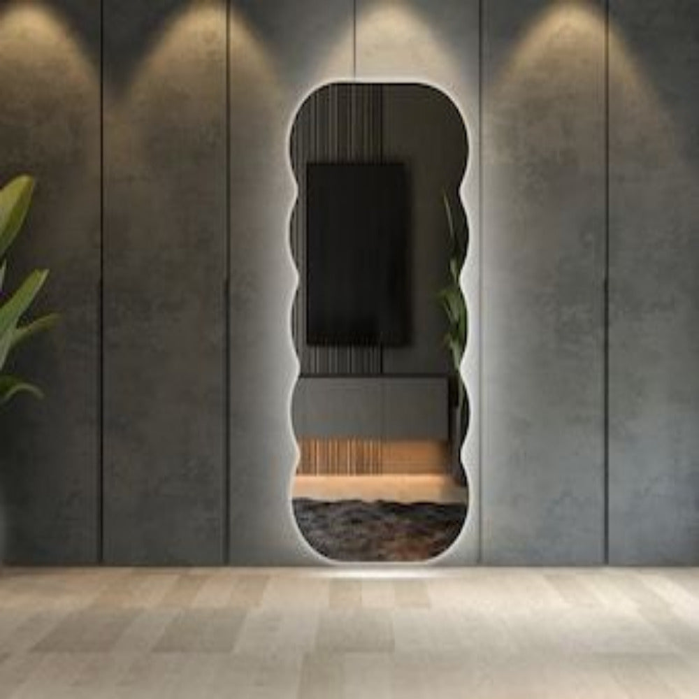 Modern wall mirror with a unique frame design on a textured wall.